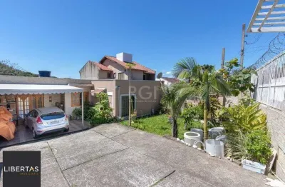 Casa para Venda - 370m², 4 dormitórios, sendo 1 suites, 6 vagas - Lomba do Pinheiro