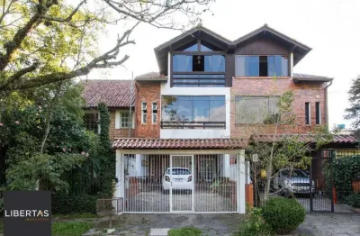 Casa com 3 quartos à venda na Rua Ponciano Pacheco da Silveira, 114, Guarujá, Porto Alegre