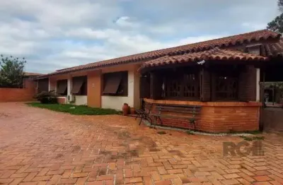 Casa com 5 quartos à venda na Rua Cariri, 174, Vila Assunção, Porto Alegre