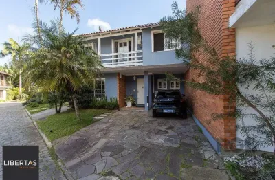 Casa em condomínio fechado com 3 quartos à venda na Rua Conrado Ferrari, 71, Jardim Isabel, Porto Alegre