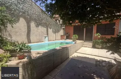 Casa com 4 quartos à venda na Rua Laguna, 181, Cavalhada, Porto Alegre