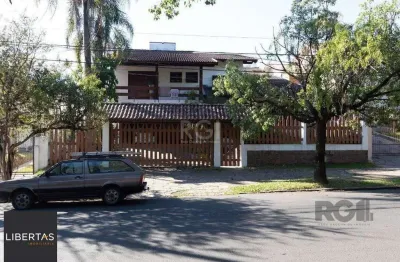 Casa com 4 quartos à venda na Rua Upamaroti, 794, Cristal, Porto Alegre