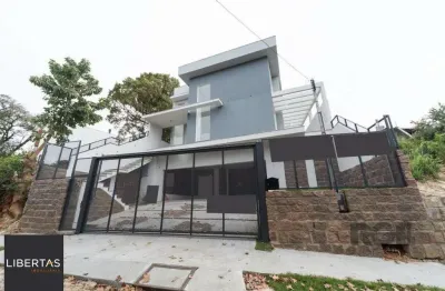 Casa com 3 quartos à venda na Rua Professor Emílio Meyer, 205, Vila Conceição, Porto Alegre