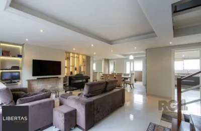 Casa com 3 quartos à venda na Rua Henrique Anawate, 580, Guarujá, Porto Alegre