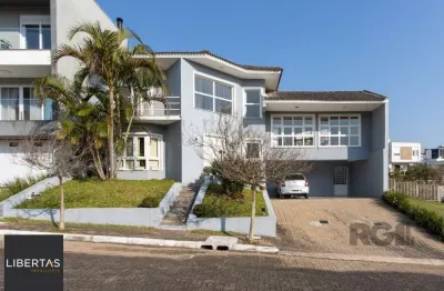 Casa em condomínio fechado com 3 quartos à venda na Rua Adriano Pereira da Silva, 450, Vila Nova, Porto Alegre
