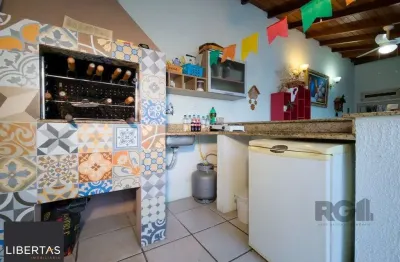 Casa em condomínio fechado com 3 quartos à venda na Avenida Eduardo Prado, 2050, Cavalhada, Porto Alegre