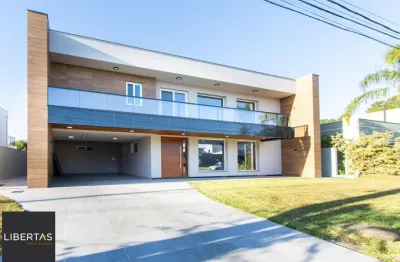 Casa em condomínio fechado com 5 quartos à venda na Avenida Juca Batista, 9000, Belém Novo, Porto Alegre