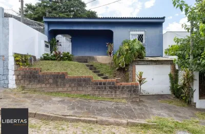 Casa com 4 quartos à venda na Rua Monte Castelo, 163, Cavalhada, Porto Alegre