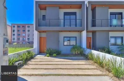 Casa em condomínio fechado com 3 quartos à venda na Avenida Edgar Pires de Castro, 2274, Restinga, Porto Alegre