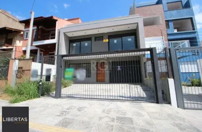 Casa com 3 quartos à venda na Rua Buarque de Macedo, 931, São Geraldo, Porto Alegre