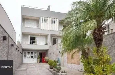 Casa com 4 quartos para alugar na Rua Arnaldo Ballve, 512, Jardim Itu Sabará, Porto Alegre