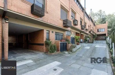 Casa em condomínio fechado com 3 quartos à venda na Avenida Jacuí, 978, Cristal, Porto Alegre