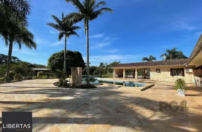 Sitio 2,0 hectares, 2 casas com suíte, 3 quartos, churrasqueira e garagem.