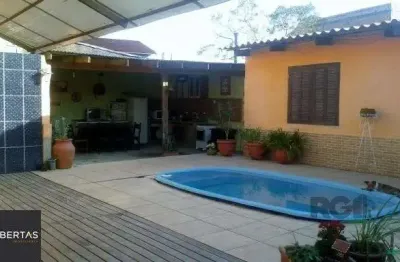 Casa com 4 quartos à venda na Rua Paulo Rubilar de Farias, 190, Restinga, Porto Alegre