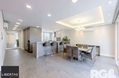 Espetacular casa nova à venda no bairro Três Figueiras!  3 suítes, 3 vagas, Generoso espaço gourmet com vista para a varanda, bem ensolarado.