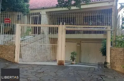 Casa com 3 quartos à venda na Rua Fagundes Varela, 153, Santo Antônio, Porto Alegre