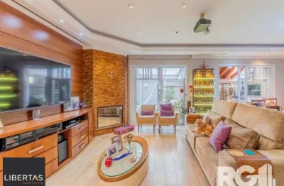 Casa em condomínio fechado com 4 quartos à venda na Rua Attílio Bilibio, 120, Jardim Carvalho, Porto Alegre