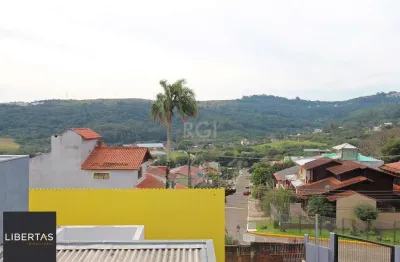 Casa para Venda - 339m², 3 dormitórios, 2 vagas - Vila Nova, Porto Alegre