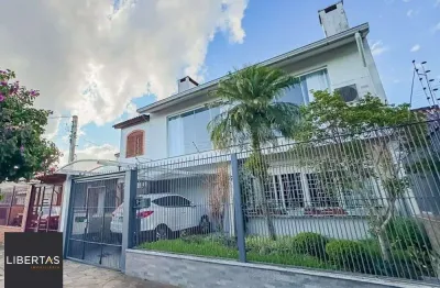 Casa com 4 quartos à venda na Rua Pedro Waine, 194, Santa Maria Goretti, Porto Alegre