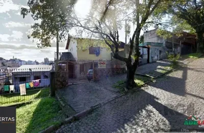 Casa com 3 quartos à venda na Avenida Teresina, 249, Medianeira, Porto Alegre