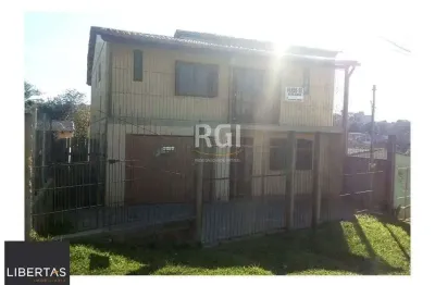 Casa para Venda - 634m², 2 dormitórios, sendo 1 suites, 3 vagas - Lomba do Pinheiro