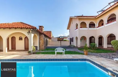 Casa com 6 quartos à venda na Rua Paulo Blaschke, 670, Jardim Planalto, Porto Alegre