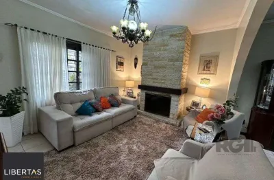 Vende-se ampla casa 3 quartos com hidro, 2 vagas, living com ladeira e salão de festas com churrasqueira - 260m² - Medianeira