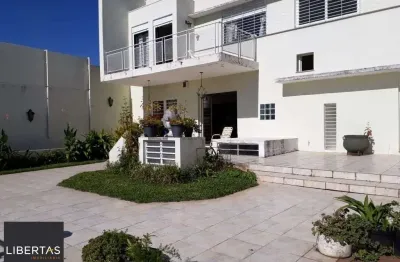 Sobrado com 4 dormitórios à venda, 498 m² por R$ 2.180.000,00 - Vila Jardim - Porto Alegre/RS