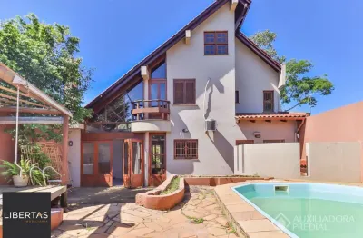 Casa com 5 quartos à venda na Avenida Jacuí, 1379, Cristal, Porto Alegre