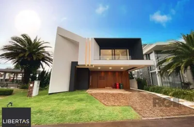 Casa em condomínio fechado com 5 quartos à venda na Rua Rio Novo, 2671, Atlântida, Xangri-Lá