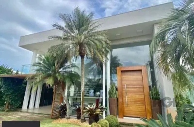 Casa em condomínio fechado com 4 quartos à venda na Avenida Interbalneários, 410, Atlântida, Xangri-Lá