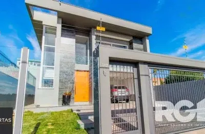 Casa com 4 quartos à venda na Rua Cecília Meireles, 312, Marechal Rondon, Canoas