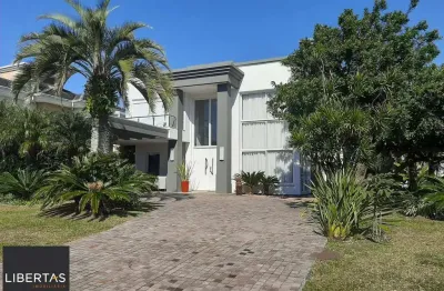 Casa no Condomínio Bosques de Atlântida a venda ou locação por temporada.