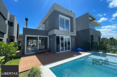 Casa em condomínio fechado com 4 quartos à venda na Rua Rio Divisa, 32, Atlântida, Xangri-Lá