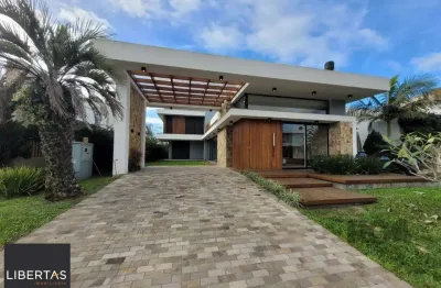 Casa em condomínio fechado com 4 quartos à venda na Avenida Jaçanã, 951, Atlântida, Xangri-Lá