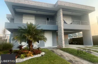 Casa em condomínio fechado com 5 quartos à venda na Rua Rio Novo, 2083, Atlântida, Xangri-Lá