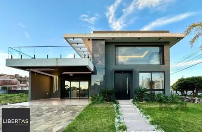 Casa com 3 quartos à venda na Rua Do Amor Perfeito, 171, Zona Nova, Capão da Canoa