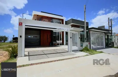 Casa com 3 quartos à venda na Rua Do Amor Perfeito, 52, Zona Nova, Capão da Canoa