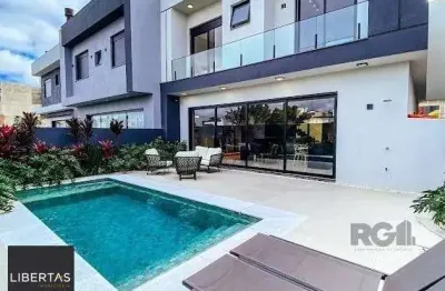 Casa em condomínio fechado com 4 quartos à venda na Rua Rio Divisa, 325, Centro, Xangri-Lá