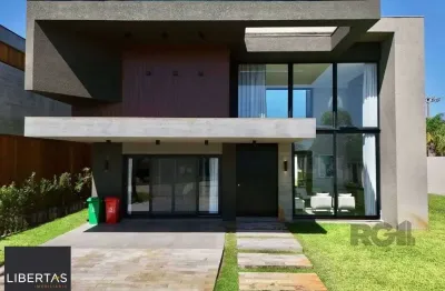 Casa em condomínio fechado com 4 quartos à venda na Rua Do Amor Perfeito, 1450, Capão Novo, Capão da Canoa