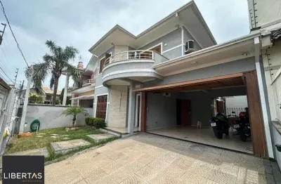 Casa com 4 quartos à venda na Rua Norbeto Gomes da Silva, 30, Parque da Matriz, Cachoeirinha