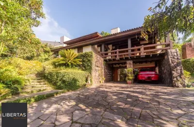 Casa com 3 quartos à venda na Avenida da Cavalhada, 5202, Cavalhada, Porto Alegre