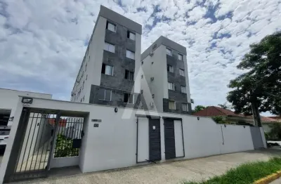 Apartamento no bairro América com 2 quartos, cozinha com armários e 1 vaga de garagem coberta.