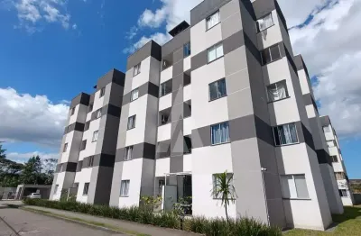 Apartamento com dois quartos, cozinha com armários e uma vaga de estacionamento descoberta localizado no bairro Pirabeiraba,