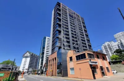 Apartamento no bairro centro com 1 suíte, cozinha com armários sob medida, sacada com churrasqueira e 1 vaga de garagem.