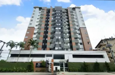 Apartamento com 3 quartos sendo 1 suíte, sacada com churrasqueira e 2 vagas de garagem no saguaçu.