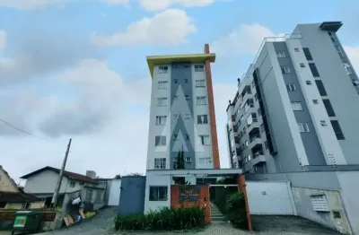 Apartamento no Bairro Bom Retiro com 2 quartos, sendo 1 suíte, sacada com churrasqueira, prédio com elevador e 1 vaga de garagem