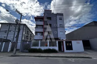Apartamento semi mobiliado, com 2 quartos sendo 1 suíte, sacada com churrasqueira e cozinha sob medida.