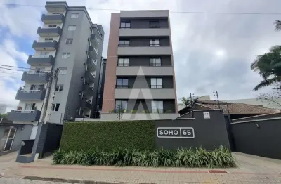 Apartamento com 2 quartos, sendo 1 suíte, prédio com elevador e 1 vaga de garagem