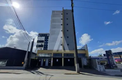 Apartamento no estilo loft com 1 quarto, cozinha com armários, sacada com churrasqueira e elevador no bairro anita garibaldi